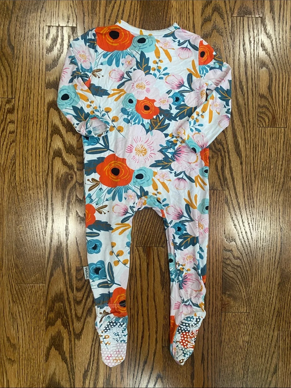 Milk Snob bamboo floral ruffle footie, size 6-12 months. Like new condition